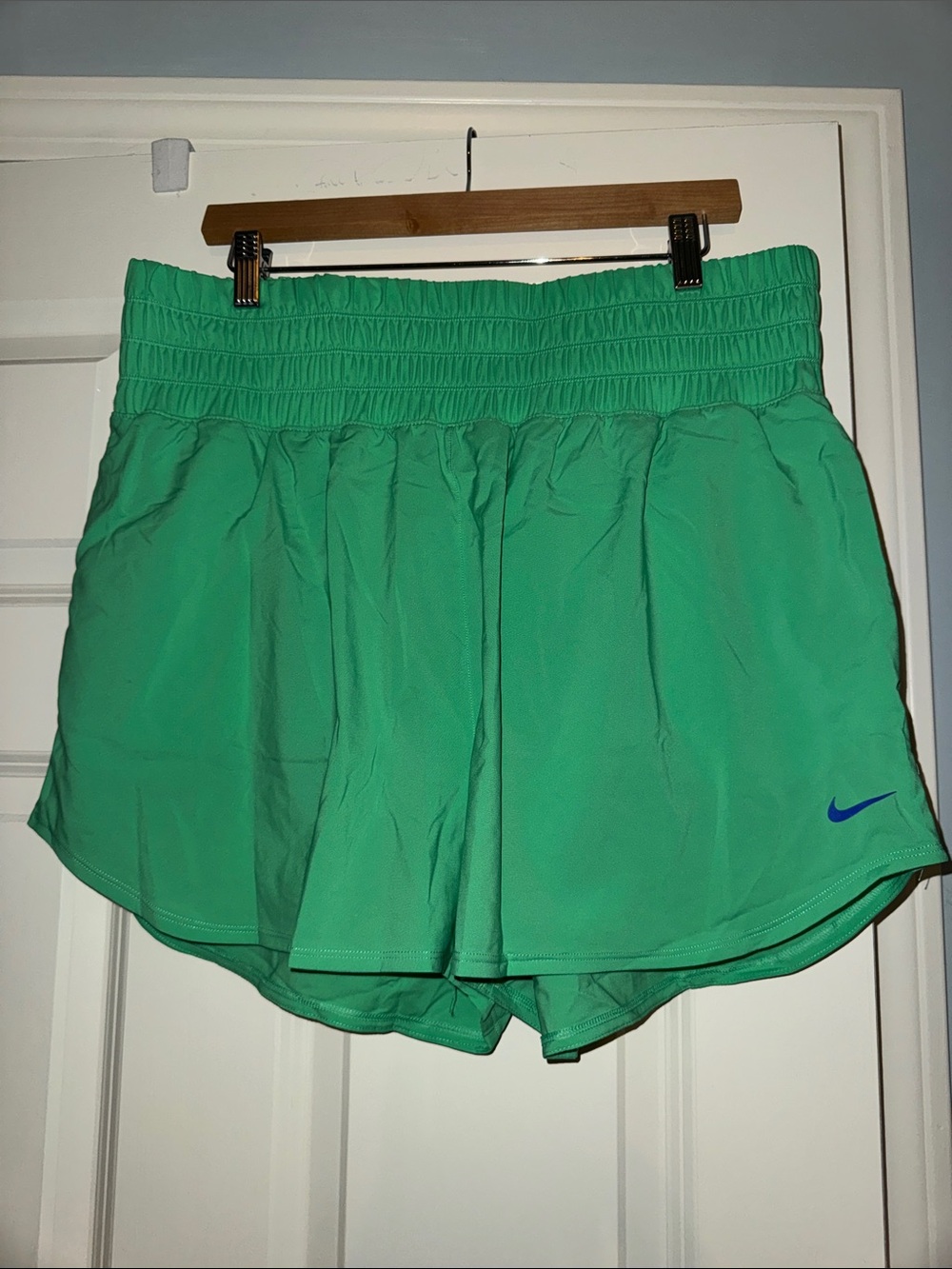 Nike Women's high waisted Bright Green Athletic Running Shorts with Blue Swoosh